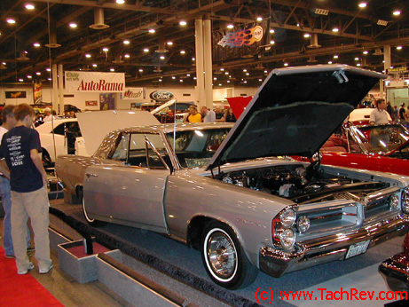 APA members Tim & Cydney Millers beautiful 1963 Silvermist Grey Grand Prix with blue Interior and Factory Option 8-Lug Wheels
