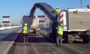 Striping the old HRP Drag Strip track surface.