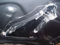 Closeup of engine-side hood structure mount of functional Grand Am Ram-Air Induction System