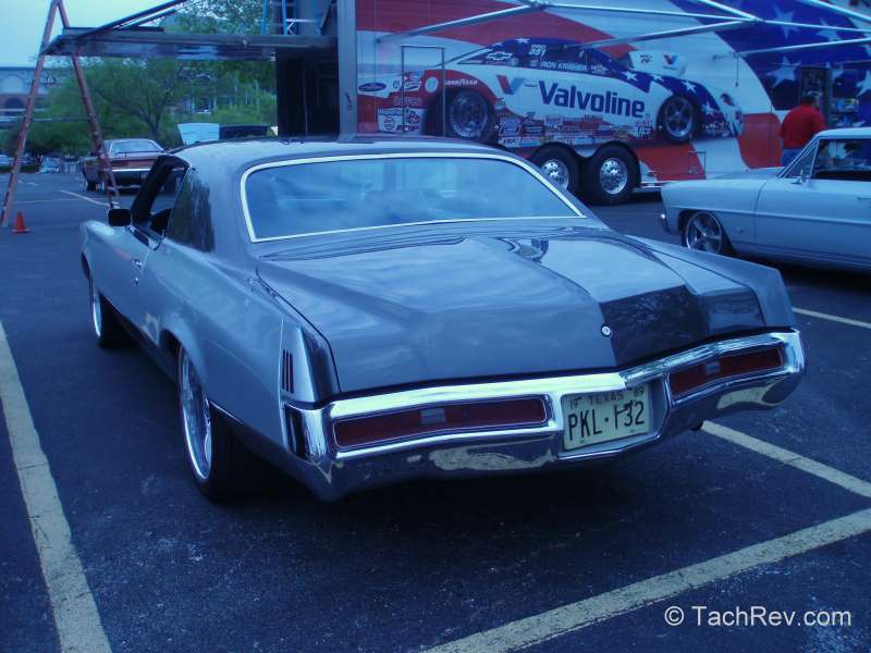 Subtle two tone silver/gray paint on this beautiful 1969 Grand Prix Restomod. 