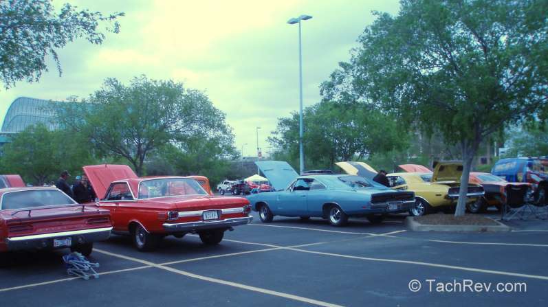 Rear view of a row of classic MOPAR Muscle, and a rare Slant 6 225 '69 Charger too!
