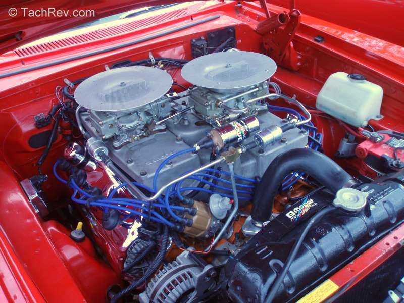 Engine compartment of Dan McCauley's 1965 Satellite Hemi creation is engineered to perfection. 