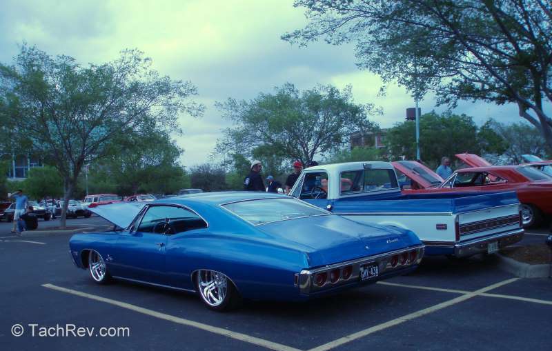 This picture does not do this fast-back Chevy justice. Paint & Body, and car details were super slick.