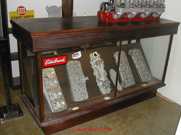 A closer view of early HOT ROD Flat-Head and intake speed parts.