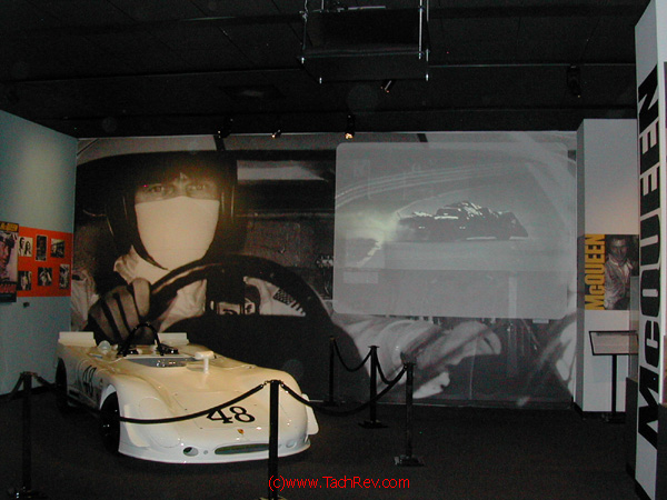 On the screen the movie Le Mans - with Steve driving, his scripted crash continues in it's severity.