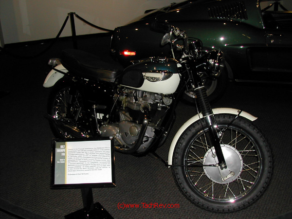 Close-up of one Steve McQueen's motorcycles - this one a Triumph - on display.
