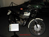 Close-up of one Steve McQueen's motorcycles - this one a Triumph - on display.