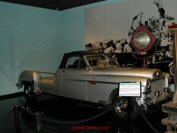 Side view of restored camera truck includes vintage MGM movie set light.
