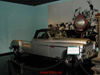 Side view of restored camera truck includes vintage MGM movie set light.