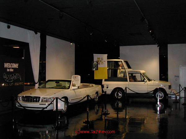 Front view of a pair of Pope Mobiles.