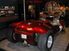 Another Rear look at the TWIN MILL in full scale. Notice the TWIN MILL California plate. Display with globe inscribed with - "The World's Coolest Car Company!"