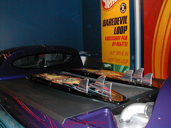 Close up of custom surf boards mounted on rear engine cover from the back of Deora II®.