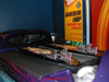 Close up of custom surf boards mounted on rear engine cover from the back of Deora II®.