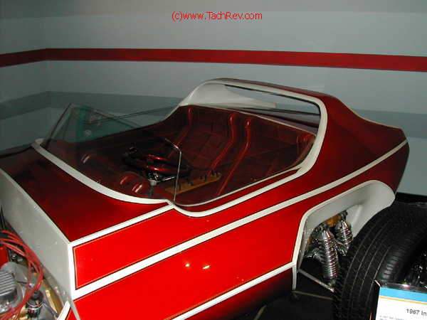 Close-up view of the INVADER's coach body, interior and the dual coil Jag IRS rear suspension.