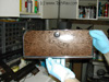 Hand restored glove box door with "burl wood treatment" simulated on all of the interior trim on the 1937 Pontiac by Glen.