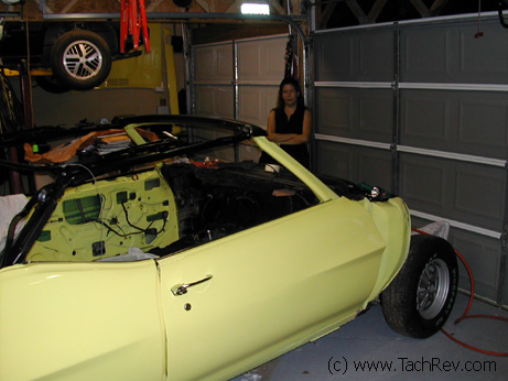 Trudy is impatient with the progress. She says "I want to drive it now!"